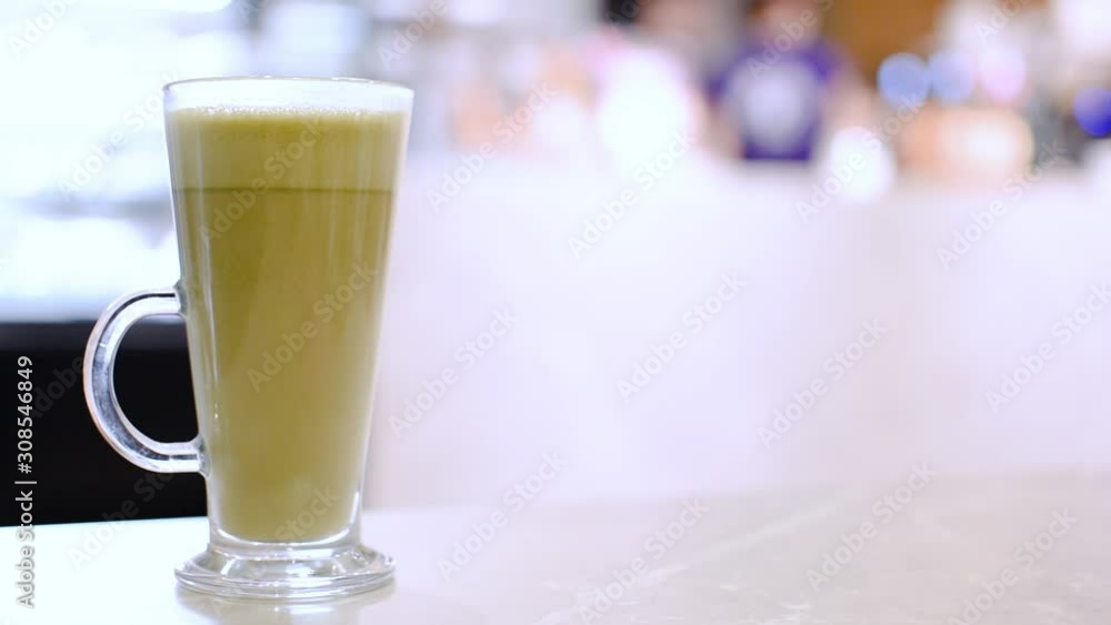 Short dynamik clip zoom to glass with matcha latte Short dynamik clip zoom to glass with matcha latte