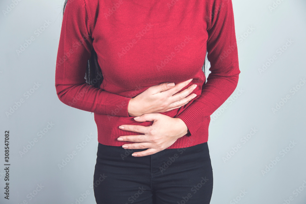 woman hand in ache stomache woman hand in ache stomache