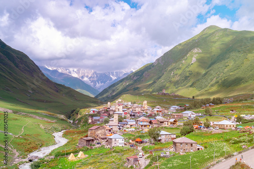 View of the Ushguli village at the foot of Mt. Shkhara. Picturesque and gorgeous scene. Rock towers and old houses in Ushguli  Georgia.