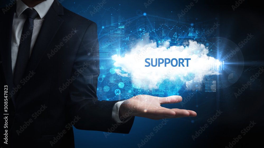 Hand of Businessman holding SUPPORT inscription, successful business concept Hand of Businessman holding SUPPORT inscription, successful business concept