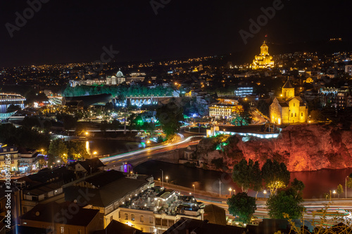 Night view of Tbilisi with Sameba (Trinity) Church and other landmarks. Beautiful Place to travel.