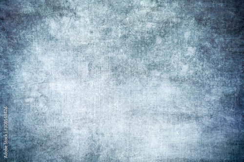 Blue stained grungy canvas backdrop