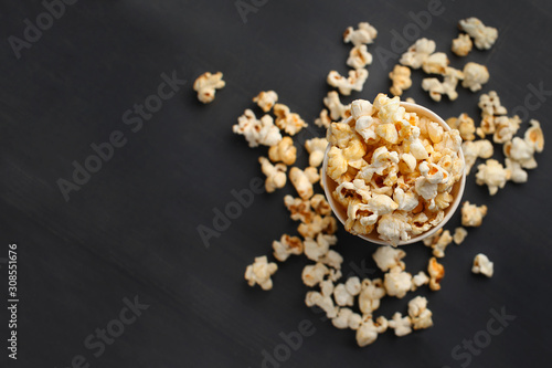 Popcorn in caramel on a dark background
