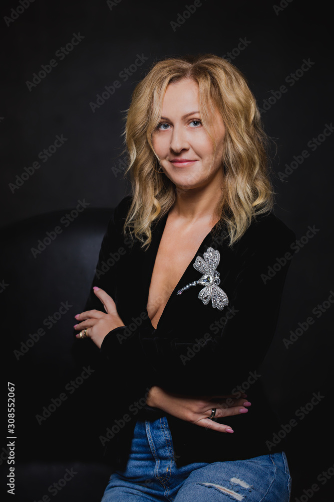 Portrait of a woman in a jacket with a brooch Portrait of a woman in a jacket with a brooch