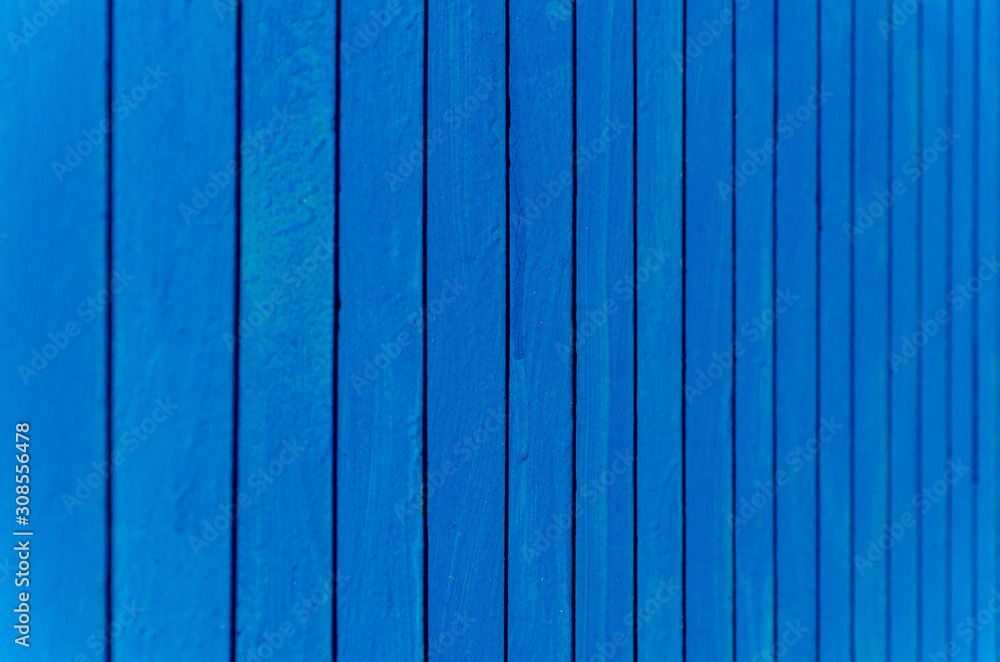 blue background with vertical lines. metal fence blue background with vertical lines. metal fence