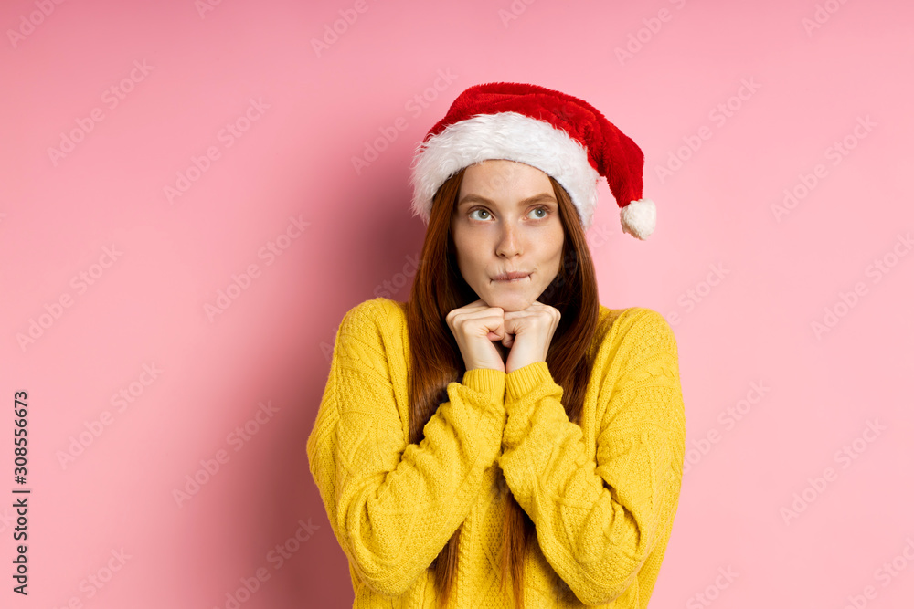 Beautiful caucasian female model wearing santa hat Beautiful caucasian female model wearing santa hat