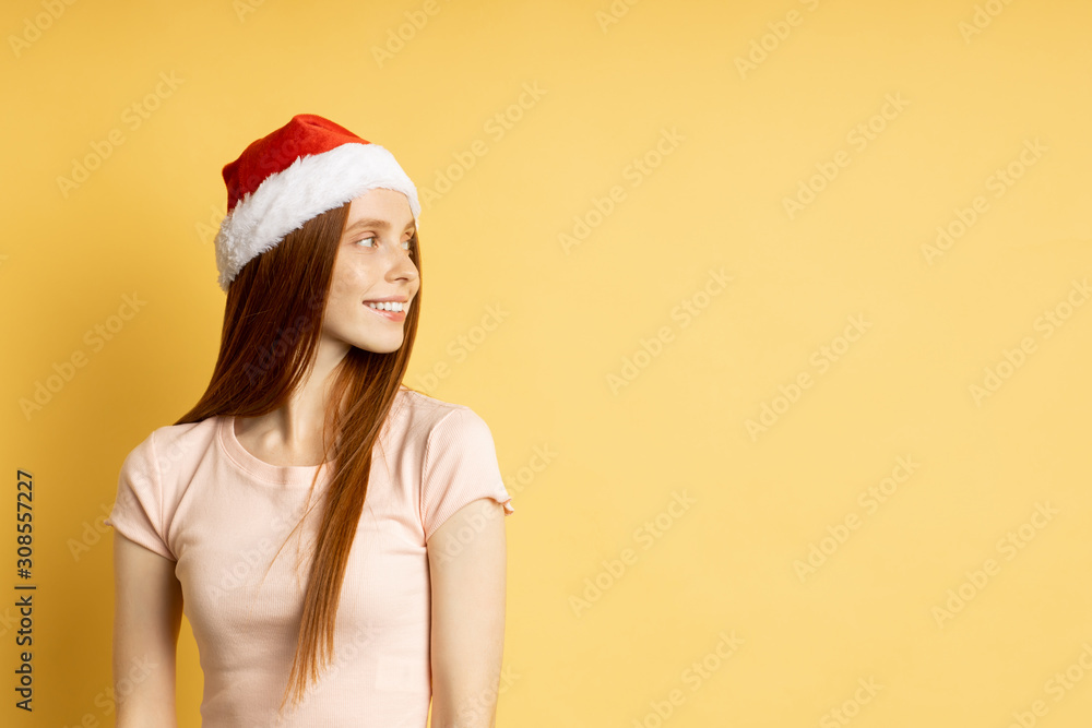 Beautiful caucasian female model wearing santa hat Beautiful caucasian female model wearing santa hat