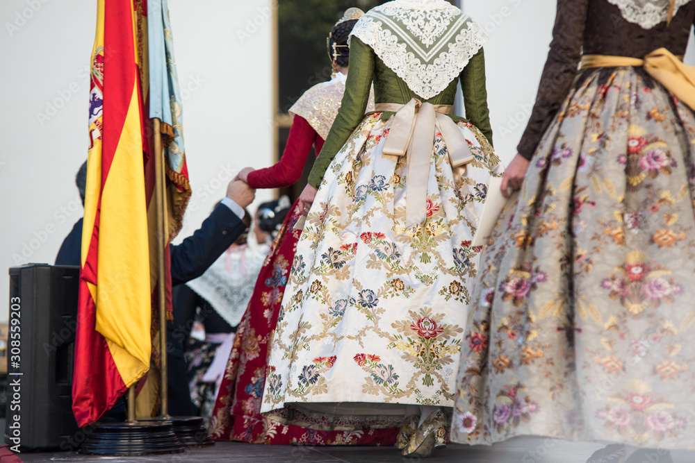 Falleras in an official act celebrating the festivity of Fallas as intangible heritage of humanity.