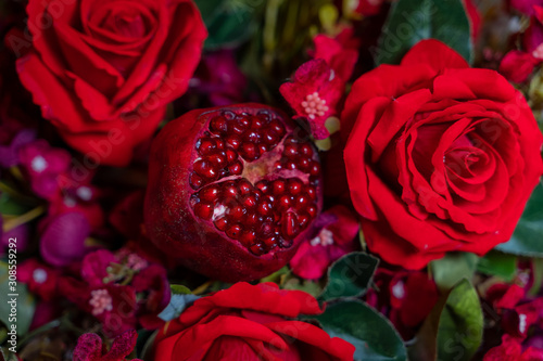 Decirations from roses and pomagranate for henna party.