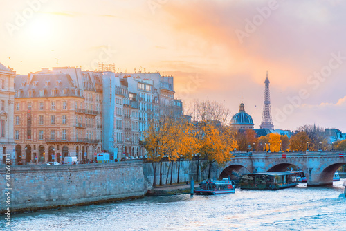 View on Siene river, Institut de France and Eiffel tower. Autumn city Paris, France. Beautiful Paris architecture