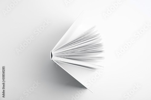 Foto Open book with hard cover on white background, top view