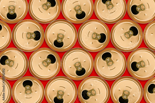 Top view of a bunch of aluminum cans for drinks. Used product for recycling. Open the jar