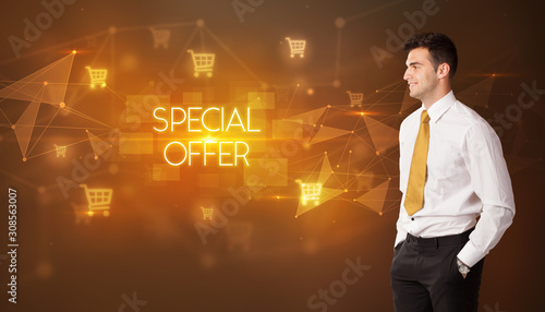 Businessman with shopping cart icons and SPECIAL OFFER inscription, online shopping concept
