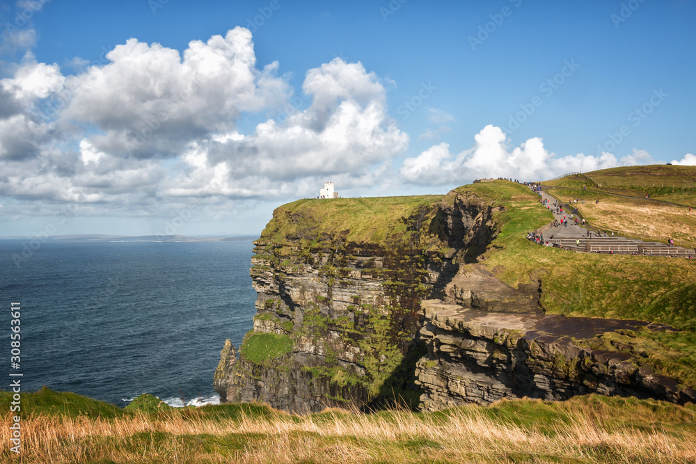 The famous Cliffs of Moher, tourist viewing location of spectacular sea cliffs in the Burren region of County Clare, Ireland. O'Brien's Tower visible.