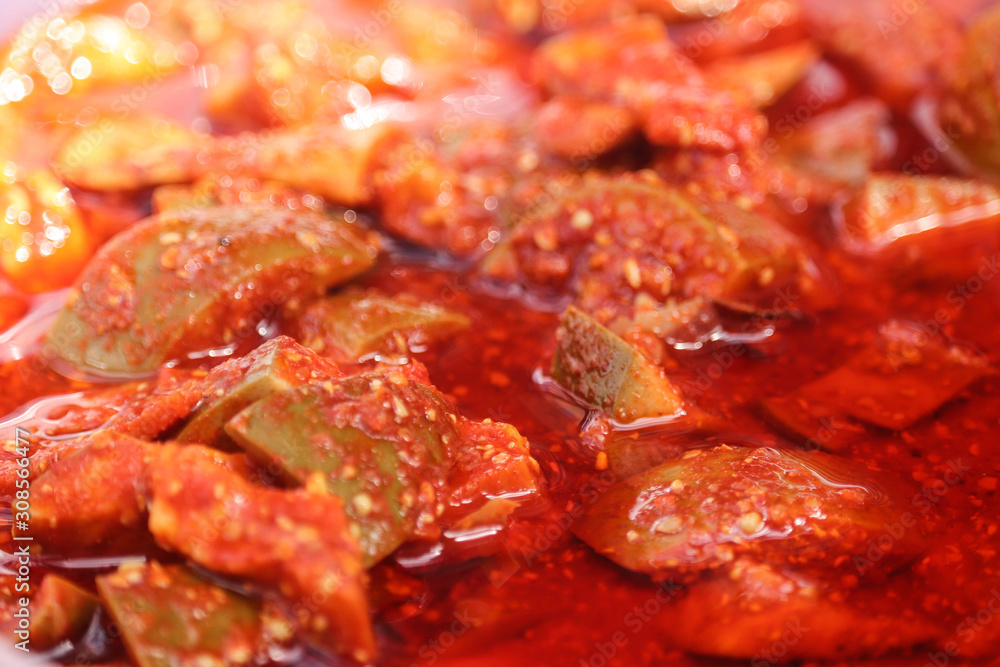 Spicy Hot Tangy Green Mango Ginger Pickles Soaked in Red Colored Oil Indian Aam Ka Aachar Spicy Hot Tangy Green Mango Ginger Pickles Soaked in Red Colored Oil Indian Aam Ka Aachar