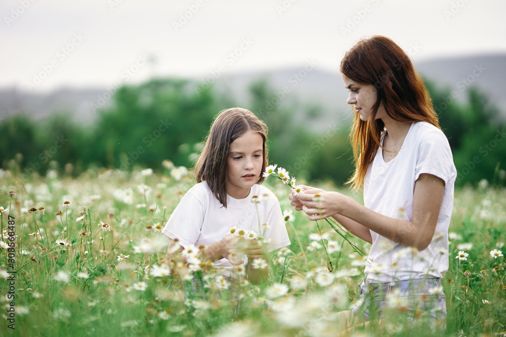 mother and daughter in the field mother and daughter in the field