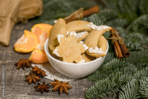 mandarin tree blue spruce background cinnamon star anise christmas present new year cookies gingerbread mulled wine