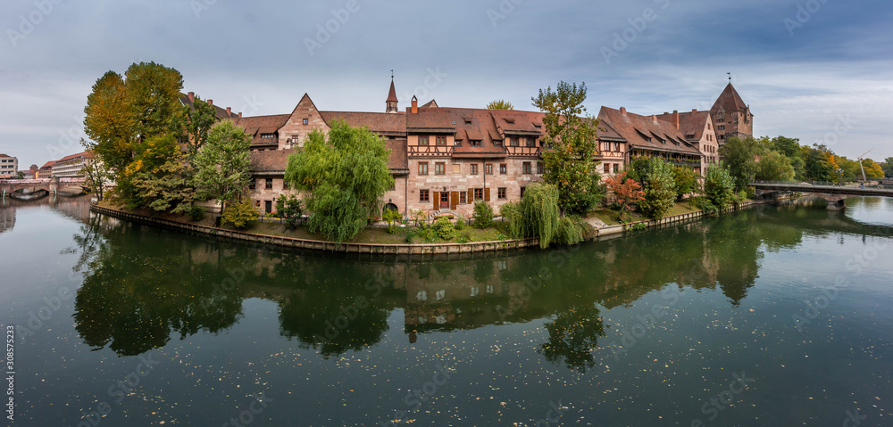 Old Residential buildings along the Panitz river, Nuremberg, Germany.