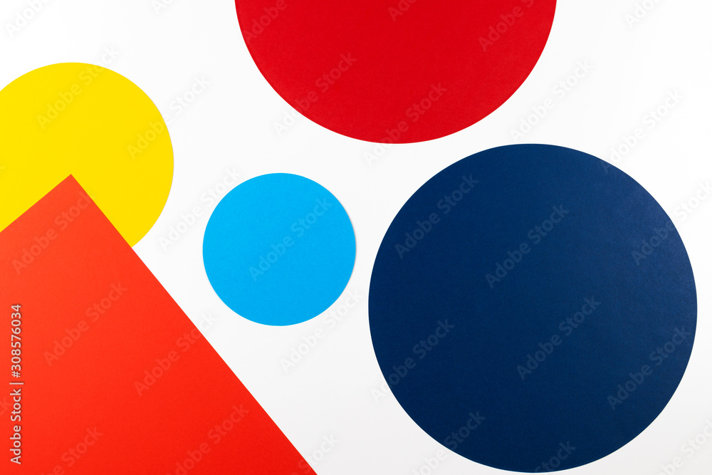 Abstract colored paper texture background. Geometric shapes and lines in blue, red, yellow, navy colors on white background Abstract colored paper texture background. Geometric shapes and lines in blue, red, yellow, navy colors on white background