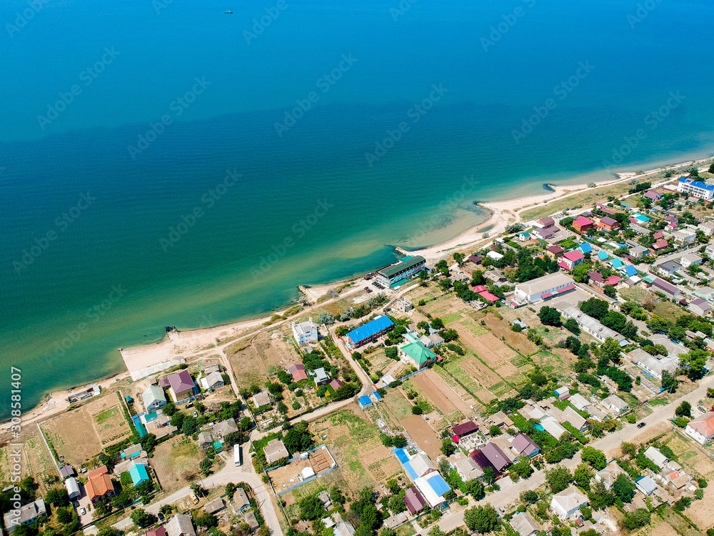 aerial view of small town near the sea