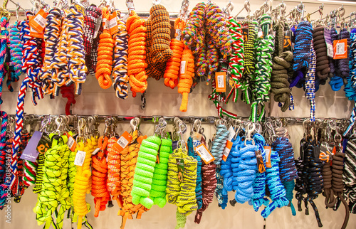 Colorful leading ropes for horses at the store