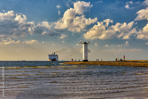 Lighthouse windmill Stawa Mlyny, Swinoujscie, Baltic Sea, Poland.