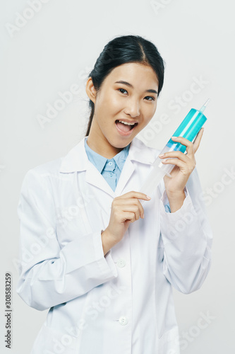 female doctor with syringe