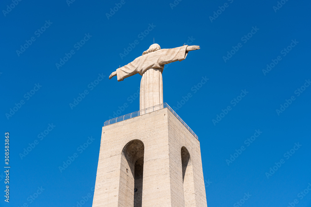 Statue of Jesus Christ in Lisbon near the bridge on October 25th. Statue of Jesus Christ in Lisbon near the bridge on October 25th.