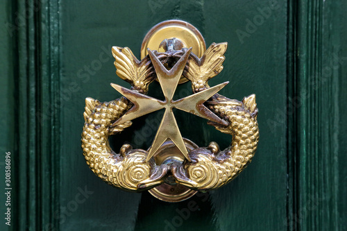 Decorative handle for the front door of brass. Malta.