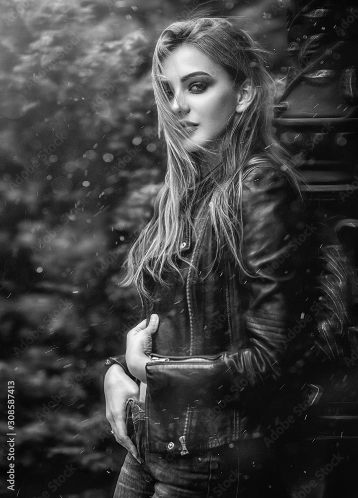 Portrait of a beautiful girl in a black leather jacket Portrait of a beautiful girl in a black leather jacket
