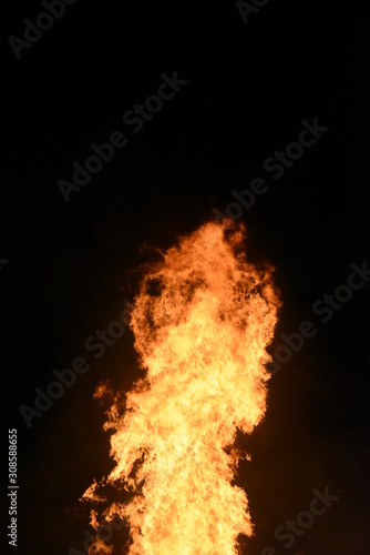 Big Bonfire by Night with Orange Glowing Flames