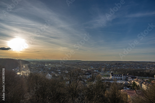 Sunset over a small european city in autumn