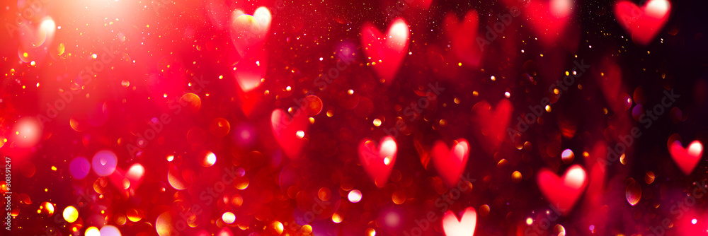 Fototapeta Valentine's Day red Background. Holiday Blinking Abstract Valentine Backdrop with Glowing Hearts. Heart Shape Bokeh. Love concept. Valentines art vivid design. Romantic banner