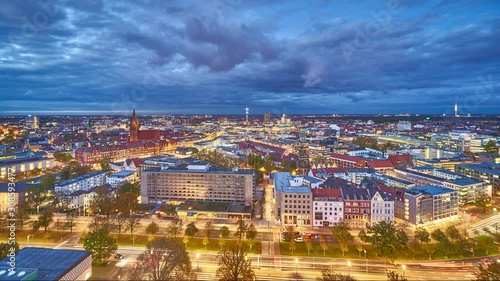 Beautiful evening aerial view of Hannover skyline cityscape. Time lapse. photo