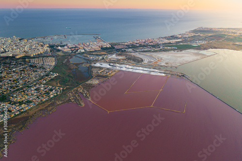 Aerial above a pink lake in Spain photo