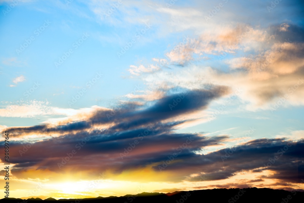 Beautiful sunset of the Sun. Bright sky. Cloud landscape background. Beautiful sunset of the Sun. Bright sky. Cloud landscape background.