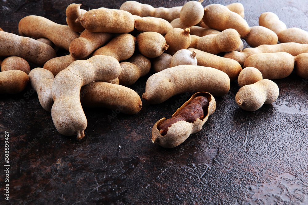 Tamarind set for health & Beauty treatment spa, hair, skin scrub, diet fruits & snack, Tamarind ripe peel shell on background Stock Photo | Adobe Stock Tamarind set for health & Beauty treatment spa, hair, skin scrub, diet fruits & snack, Tamarind ripe peel shell on background Stock Photo | Adobe Stock
