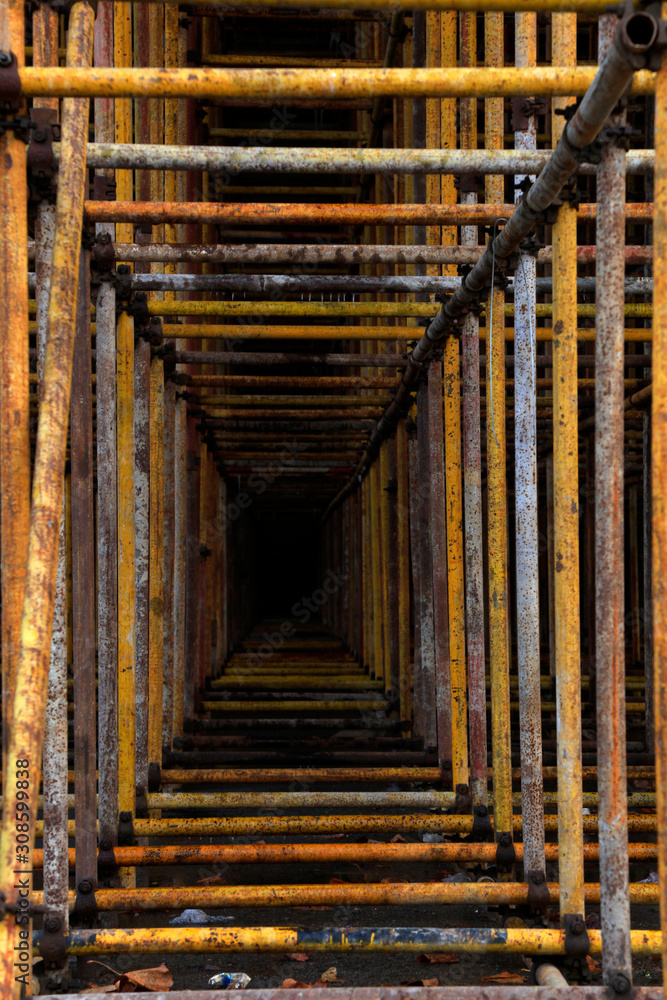 Scaffolding steel pipe at a construction site Scaffolding steel pipe at a construction site