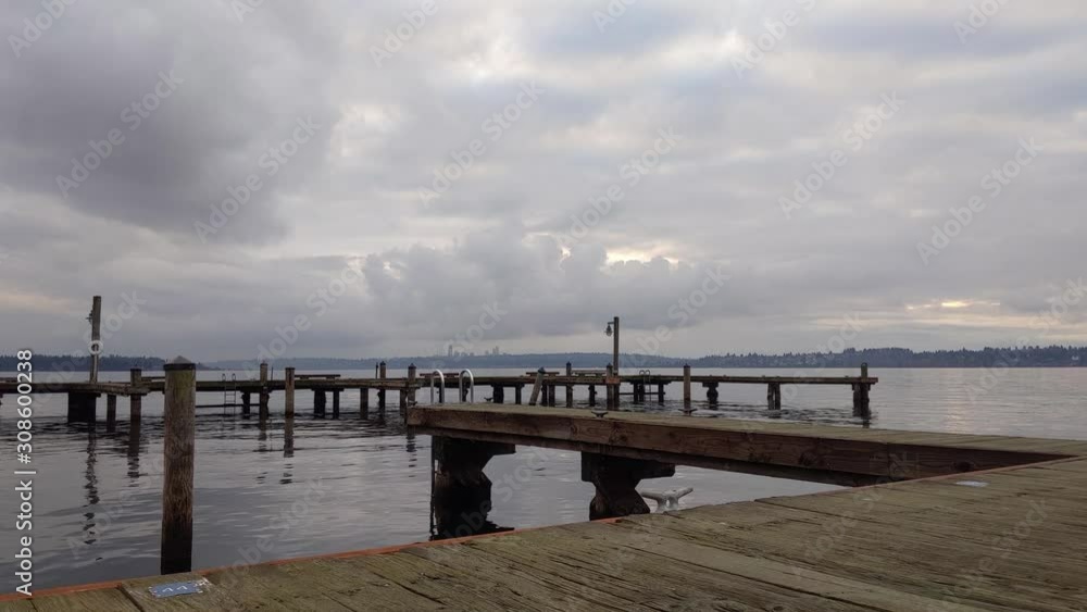 Peaceful view of Lake Washington boat docks on an overcast, slightly rainy day, no one around Peaceful view of Lake Washington boat docks on an overcast, slightly rainy day, no one around