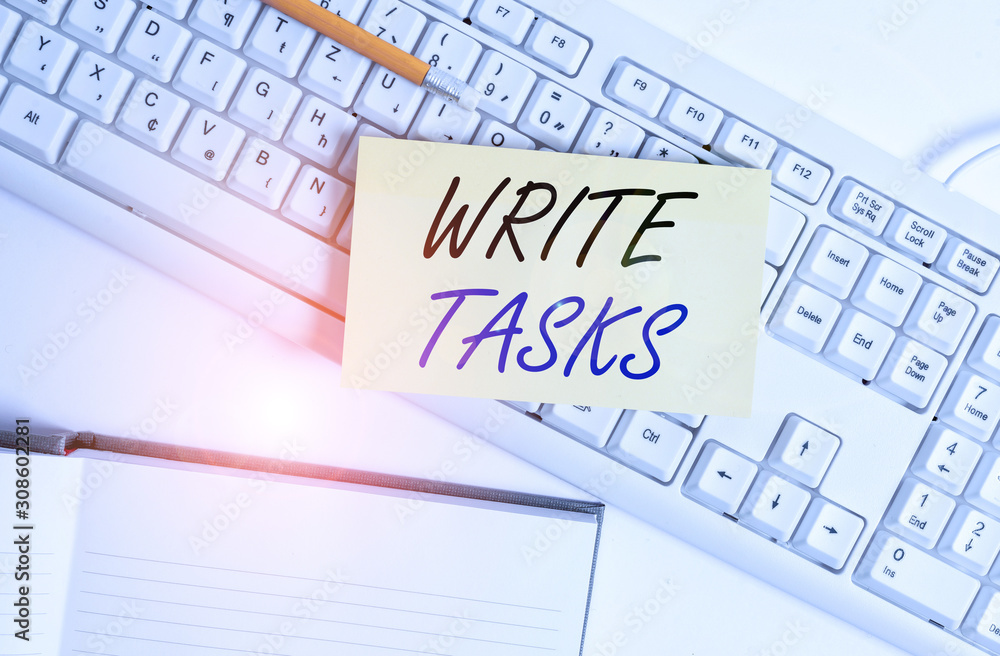Word writing text Write Tasks. Business photo showcasing assigned piece of work often to be finished within certain time White pc keyboard with empty note paper and paper clips above white background Word writing text Write Tasks. Business photo showcasing assigned piece of work often to be finished within certain time White pc keyboard with empty note paper and paper clips above white background