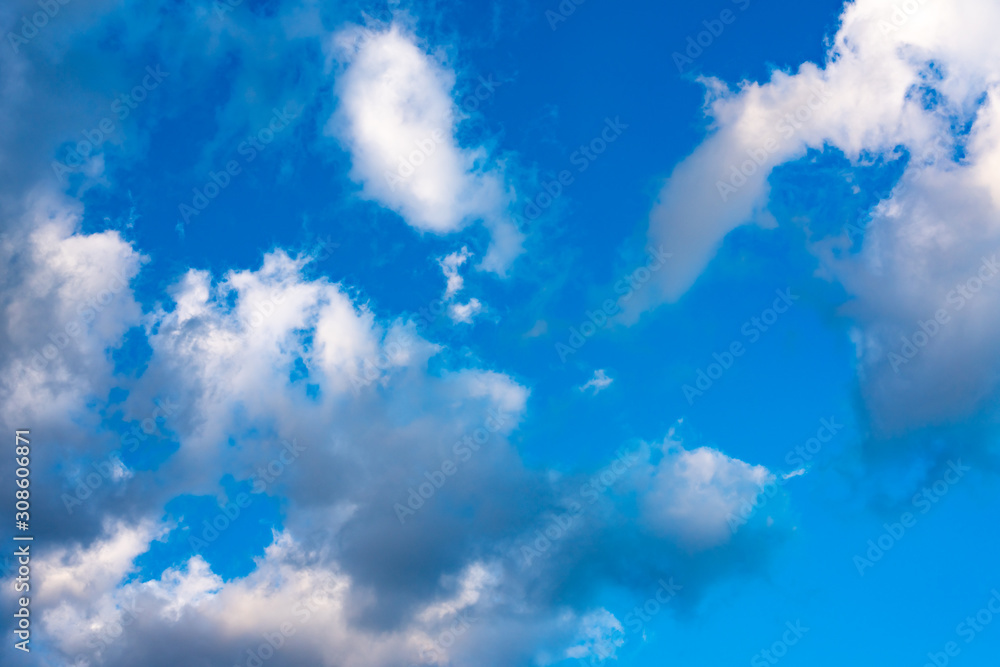 Obraz premium Blue sky with white clouds. Blue sky with black clouds.
