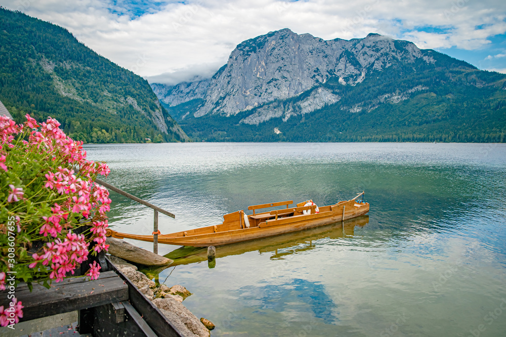 lake in the mountains in austrian alps in beautiful summer tourist season with blue sky and clear water