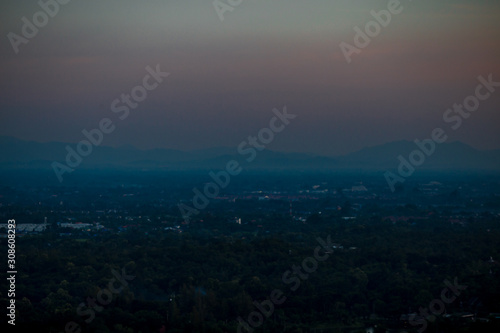 Blurry background Of the natural, high angle view From the viewpoint, you can see the colorful sky and see the houses surrounded. © bangprik