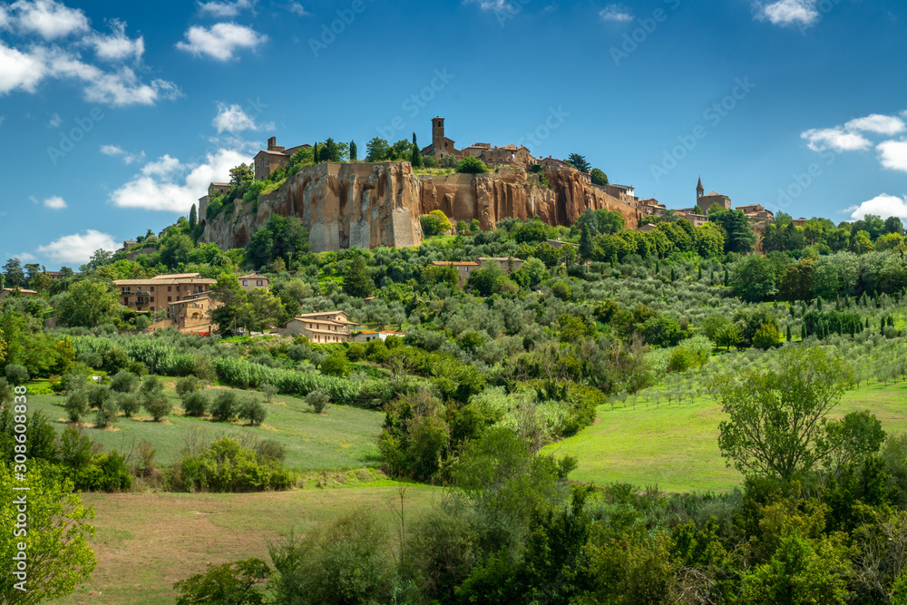 Orvieto, Umbria Italy. The ancient city of Orvieto is build on the flat summit of a large butte of volcanic tuff. Surrounded by beautyful meadows with olive and cypress trees.