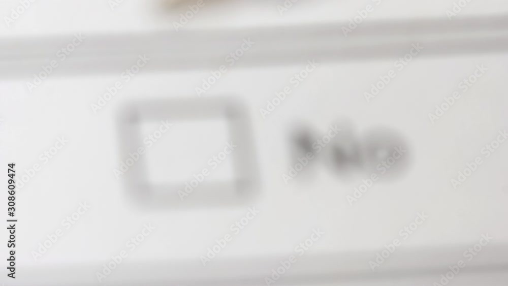 Ballpoint pen close up. Tick in ballot box, voting and elections. Ballpoint pen close up. Tick in ballot box, voting and elections.