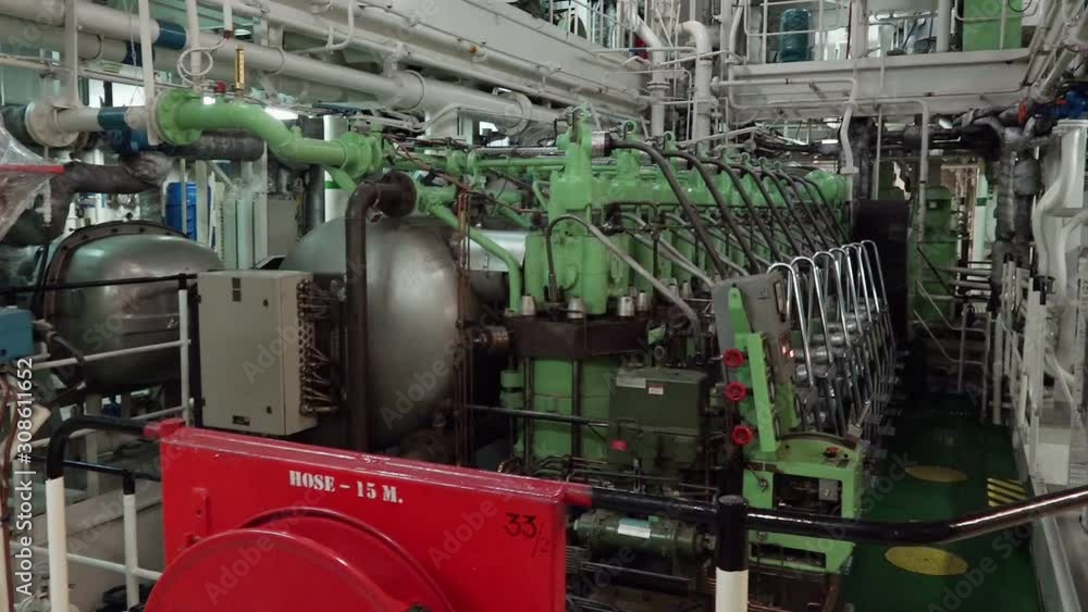 main tanker powerful propulsion unit and compressors work in huge tanker engine compartment close motion main tanker powerful propulsion unit and compressors work in huge tanker engine compartment close motion