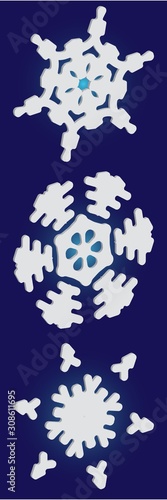 Set of christmas paper snowflakes on blue background.