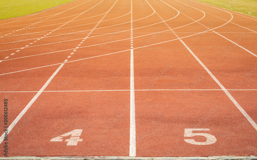 The number at start point of running track or athlete track in stadium. Running track is a rubberized artificial running surface for track and field athletics. The number at start point of running track or athlete track in stadium. Running track is a rubberized artificial running surface for track and field athletics.