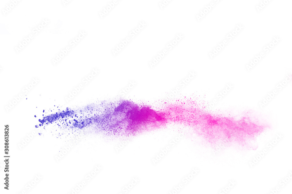 Freeze motion of purple color powder exploding on white background.