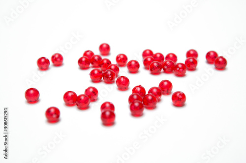 Red beads on a  white background